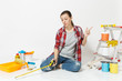 © ViDi Studio - Woman in casual clothes sitting on floor with measure tape, instruments for renovation apartment isolated on white background. Wallpaper, accessories for gluing, painting tools. Repair home concept.