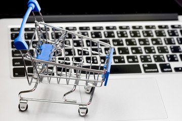 close up of Cart on keyboard computer with tablet background