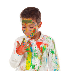 Canvas Print - Funny boy with hands and face full of paint