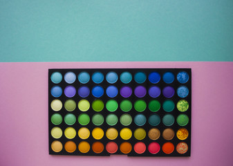 Eyeshadows on colorful background.