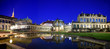 Panorama of Dresden Zwinger Palace in Rococo style at night with reflection in water basin, Dresden, Saxony, Eastern Germany 