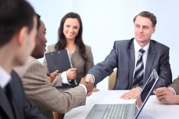 Wall Mural - handshake business partners at a business meeting