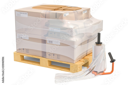 Cuadros en Lienzo Manual film stretch wrapping machine and wooden pallet with parcels wrapped in t