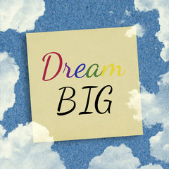 Wall Mural - Dream Big inspirational quote on sky background