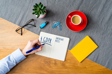Wall Mural - gdpr writing on notebook for data protection regulation as flat lay from above