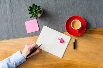 Wall Mural - Empty notebook with copy space and hand as flat lay and template