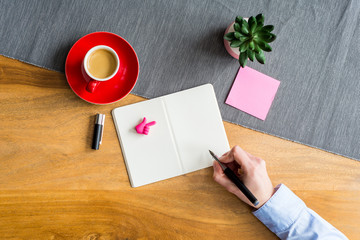 Wall Mural - Empty notebook with copy space and hand as flat lay and template