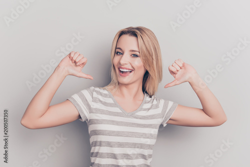 It is me! Portrait of smiling cheerful nice modern cute positive woman in casual Poster Mural XXL