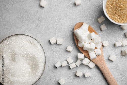Fotomural Composition with various kinds of sugar on gray background