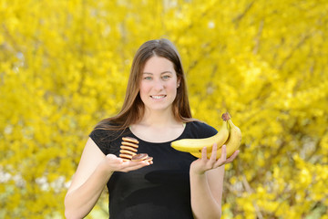 Beautiful attractive young woman holding healthy detox vegetable. Healthy lifestyle concept.