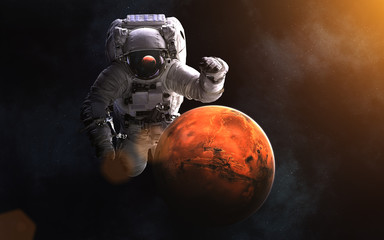 Wall Mural - giant astronaut and mars. image in 5k resolution for desktop wallpaper. elements of the image are fu