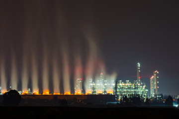 Wall Mural - Oil and gas refinery plant area at twilight