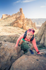 Wall Mural - Woman hiker reached mountain top, summer activity