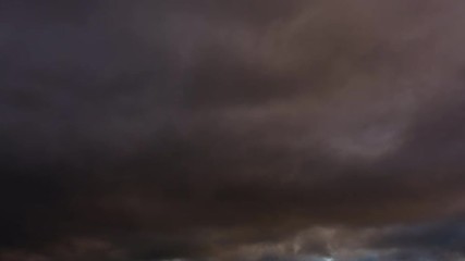 Wall Mural - majestic storm clouds drift in the wind, timelapse.