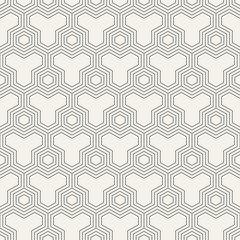 Abstract seamless pattern of triangular elements.