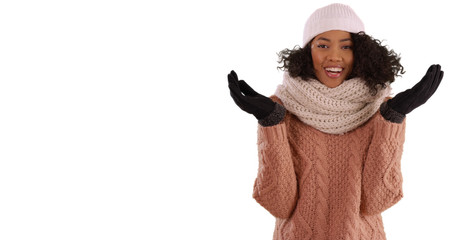 Wall Mural - Happy African-American woman in winter attire posing on white copy space