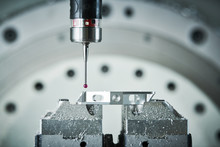 Quality Control On Milling CNC Machine. Precision Probe Sensor At Industrial Metalworking