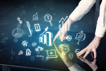 Poster - Man touching technology smart table with business icons and symbols