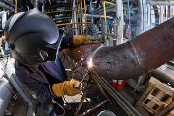 Canvas Print - Welding works at installation of new pipeline