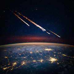 Wall Mural - Falling meteorite, asteroid, comet on Earth. Elements of this image furnished by NASA.