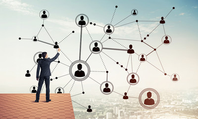 businessman on house roof presenting networking and connection c