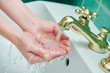 Washing hands. hygiene and dysentery prevention. faucet tap with flowing water