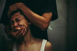 Father being physically abusive towards son, domestic violence concept.