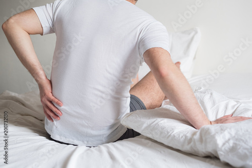 Fotografie, Obraz Uncomfortable mattress and pillow causes neck pain