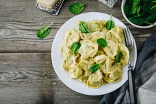 Italian Ravioli Pasta With Spinach And Ricotta On Wooden Background