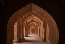 Mandu India, Afghan Ruins Of Islam Kingdom, Palace Interior, Mosque Monument And Muslim Tomb. Sunshine From Door In Dark Corridor.