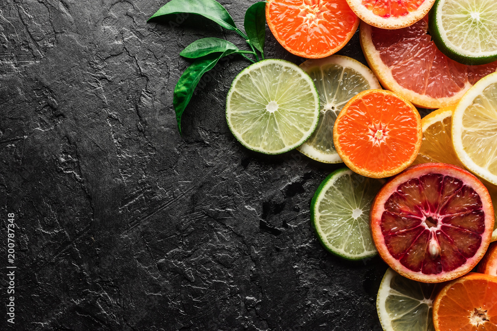 Mix of different citrus fruits closeup. Healthy diet vitamin concept. Food photography - obrazy, fototapety, plakaty 
