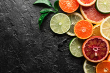 Mix Of Different Citrus Fruits Closeup. Healthy Diet Vitamin Concept. Food Photography