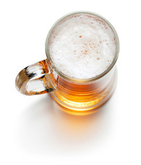 Wall Mural - top view of mug of beer isolated on white background