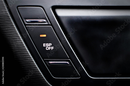 Fotografía Close up inside car, button to disable traction control ESP