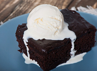 Chocolate pastry with chocolate cream and white ice cream.