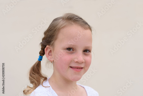 Fotografia, Obraz Nice cute little girl with beautiful healthy freckle skin and long blonde braided hair portrait