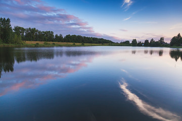 Wall Mural - Still lake dramatic landscape in summer