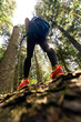 © Novak - Low angle view of female hiker outdoor