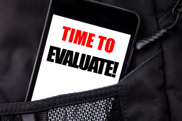 Wall Mural - handwritten text showing time to evaluate. business concept writing for assessment evaluation writte