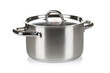 Open stainless steel cooking pot with lid over white