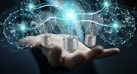 Poster - Businessman connecting modern lightbulbs with connections 3D rendering