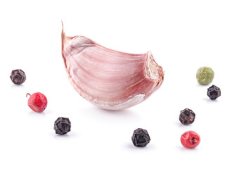 Wall Mural - Clove of garlic with peppercorn isolated on white background