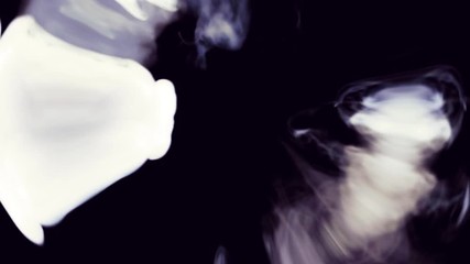 Poster - Smoking ring. Isolated on black. circular smoke cloud background, isolated on black. cloud on the black background