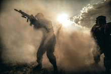 United States Marines In Action. Military Equipment, Army Helmet, Warpaint, Smoked Dirty Face, Tactical Gloves. Military Action, Desert Battlefield, Smoke Grenades