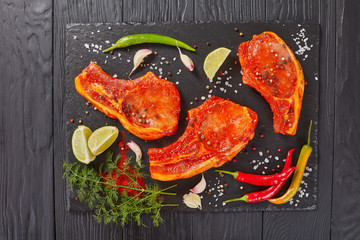 Wall Mural - raw pork chops marinated with spices