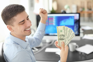 Poster - Office employee with money at workplace. Forex concept