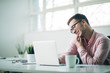© Suteren Studio - Young man in office
