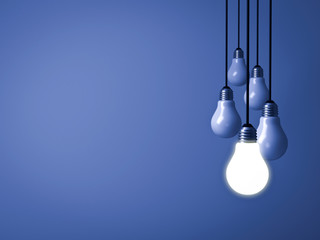 Leinwandbilder - One hanging light bulb glowing on dark blue background with unlit light bulbs . 3D rendering.
