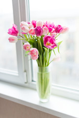 Poster - A bouquet of  tulips in a vase. Soft selective focus