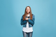 © master1305 - Beautiful teen girl looking suprised isolated on blue